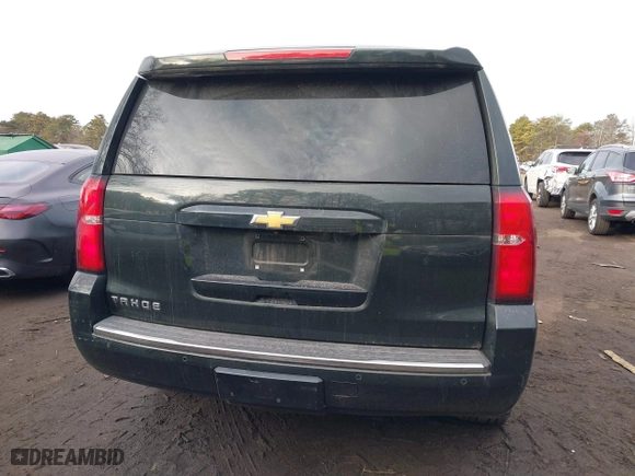 2016 Chevrolet Tahoe LTZ with VIN 1GNSKCKC1GR297871, listed as a IAAI auction lot 41442380 with 91,354 mi miles. Bid and sale history available at carsss.com. Image 16.