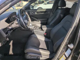 2023 Honda Civic Sport Touring z VIN 19XFL1H85PE402177, wystawiony jako Copart lot #52611605 z przebiegiem 56 306 mil mil oraz Szkoda całkowita • Salvage title. Historia ofert i sprzedaży dostępna na DreamBid. Obrazek 7.