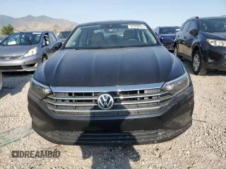 2021 Volkswagen Jetta SEL z VIN 3VWE57BU5MM013374, wystawiony jako Copart lot #62359125 z przebiegiem 50 969 mil mil oraz Czysty tytuł • Clean title. Historia ofert i sprzedaży dostępna na DreamBid. Obrazek 5.