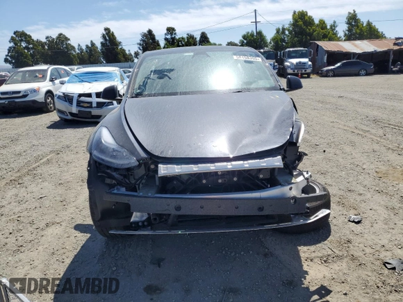 2024 Tesla Model Y Long Range z VIN 7SAYGDEE6RF032348, wystawiony jako Copart lot #58158355 z przebiegiem Nie podano mil oraz Szkoda całkowita • Salvage title. Historia ofert i sprzedaży dostępna na DreamBid. Obrazek 5.