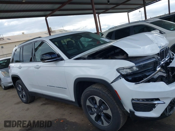 2023 Jeep Grand Cherokee with VIN 1C4RJYB60PC650900, listed as a IAAI auction lot 41773825 with 19,243 mi miles and . Bid and sale history available at DreamBid. Image 14.