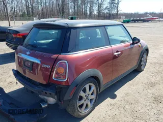 2007 MINI Hardtop with VIN WMWMF33537TU60428, listed as a IAAI auction lot 41753810 with 218,137 mi miles and . Bid and sale history available at DreamBid. Image 4.