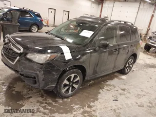 2018 Subaru Forester Premium with VIN JF2SJAGCXJH490690, listed as a IAAI auction lot 41607806 with 95,731 mi miles. Bid and sale history available at carsss.com. Image 2.