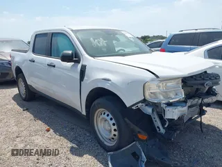 2022 Ford Maverick XL z VIN 3FTTW8E95NRA98984, wystawiony jako IAAI lot #42210407 z przebiegiem 7938 mil mil oraz . Historia ofert i sprzedaży dostępna na DreamBid. Obrazek 1.