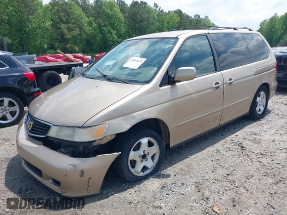 2000 Honda Odyssey EX with VIN 2HKRL1868YH513587, listed as a IAAI auction lot 42092115 with 302,555 mi miles and . Bid and sale history available at DreamBid. Image 2.