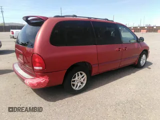 2000 Dodge Caravan SE z VIN 1B4GP44G9YB779386, wystawiony jako IAAI lot #41959352 z przebiegiem 139 648 mil mil oraz . Historia ofert i sprzedaży dostępna na DreamBid. Obrazek 4.