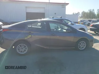 2022 Toyota Prius L Eco with VIN JTDKAMFU0N3173997, listed as a IAAI auction lot 42182489 with 41,220 mi miles and . Bid and sale history available at DreamBid. Image 14.