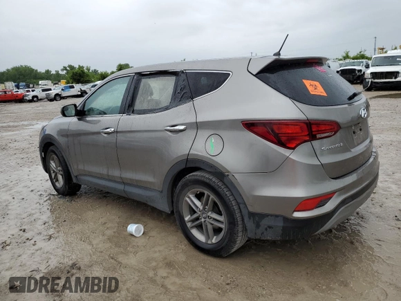 2018 Hyundai Santa Fe 2.4L z VIN 5NMZTDLB0JH087449, wystawiony jako Copart lot #58903105 z przebiegiem 114 037 mil mil oraz Szkoda całkowita • Salvage title. Historia ofert i sprzedaży dostępna na DreamBid. Obrazek 2.