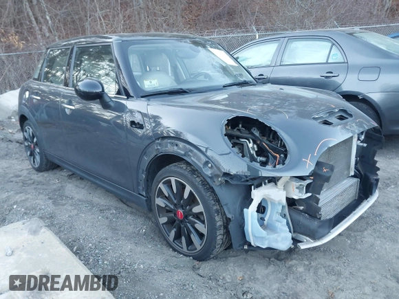 2016 MINI Cooper Hardtop 4 Door S with VIN WMWXU3C56G2B63682, listed as a IAAI auction lot 41244676 with 110,902 mi miles. Bid and sale history available at carsss.com. Image 1.