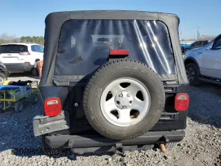2005 Jeep Wrangler SE with VIN 1J4FA29195P366658, listed as a Copart auction lot 46220295 with 67,359 mi miles and Salvage Title. Bid and sale history available at carsss.com. Image 6.