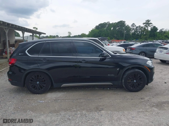 2017 BMW X5 xDrive40e iPerformance with VIN 5UXKT0C30H0V95867, listed as a IAAI auction lot 42122827 with 84,271 mi miles. Bid and sale history available at carsss.com. Image 13.