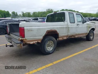1995 Ford F-150 z VIN 1FTEX14H6SKC19656, wystawiony jako IAAI lot #42289301 z przebiegiem Nie podano mil oraz . Historia ofert i sprzedaży dostępna na DreamBid. Obrazek 4.