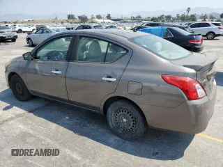 2016 Nissan Versa S with VIN 3N1CN7AP0GL803412, listed as a Copart auction lot 64677645 with 96,788 mi miles and Salvage title. Bid and sale history available at DreamBid. Image 2.
