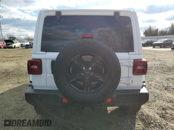 2022 Jeep Wrangler Unlimited Sahara Altitude with VIN 1C4HJXEG2NW260905, listed as a Copart auction lot 86986584 with 7,219 mi miles and Non Repairable. Bid and sale history available at DreamBid. Image 6.