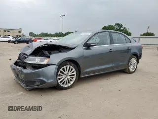 2014 Volkswagen Jetta TDI w/Premium/Nav with VIN 3VWLL7AJ1EM375983, listed as a Copart auction lot 57558845 with 166,093 mi miles and Salvage title. Bid and sale history available at DreamBid. Image 1.