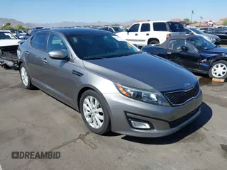 2014 Kia Optima EX z VIN 5XXGN4A72EG339786, wystawiony jako IAAI lot #42328516 z przebiegiem 103 035 mil mil oraz . Historia ofert i sprzedaży dostępna na DreamBid. Obrazek 1.