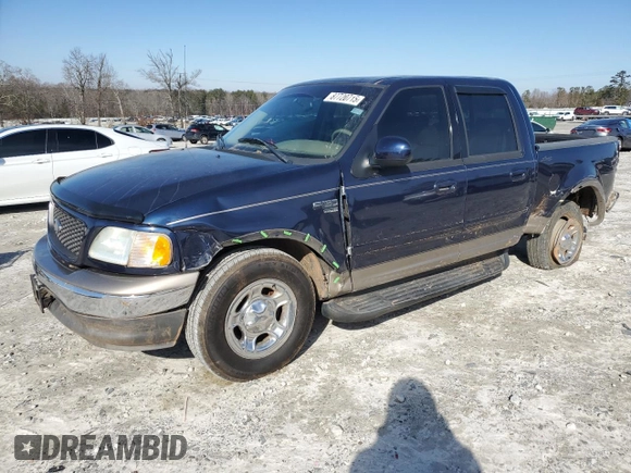 2002 Ford F-150 XLT with VIN 1FTRW07L52KA67609, listed as a Copart auction lot 87720715 with 177,615 mi miles and Salvage Title. Bid and sale history available at carsss.com. Image 1.