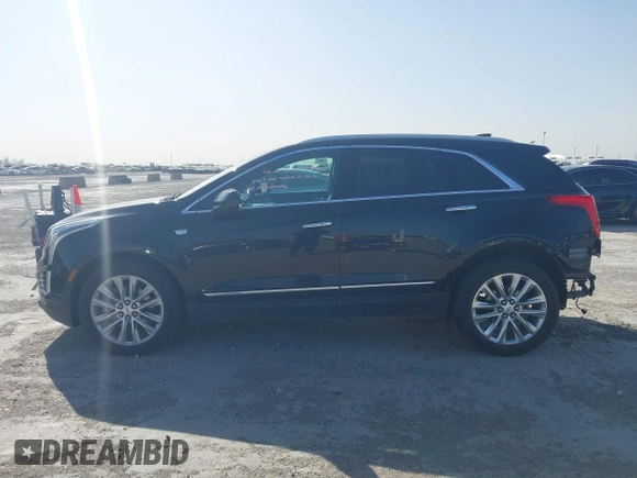 2017 Cadillac XT5 Platinum AWD z VIN 1GYKNFRS7HZ103127, wystawiony jako IAAI lot #41830037 z przebiegiem 82 480 mil mil oraz . Historia ofert i sprzedaży dostępna na DreamBid. Obrazek 15.
