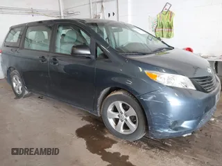 2014 Toyota Sienna L with VIN 5TDZK3DCXES434910, listed as a IAAI auction lot 41731864 with 146,161 mi miles. Bid and sale history available at carsss.com. Image 1.