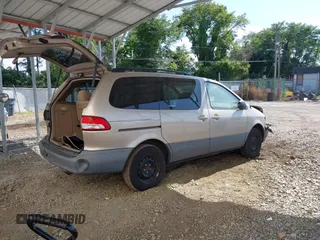 2002 Toyota Sienna LE with VIN 4T3ZF13C82U465335, listed as a IAAI auction lot 40274809 with 178,560 mi miles and . Bid and sale history available at DreamBid. Image 4.