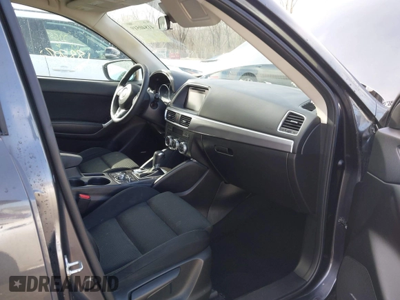 2016 Mazda CX-5 Touring with VIN JM3KE4CY9G0915305, listed as a IAAI auction lot 41840519 with 188,702 mi miles and . Bid and sale history available at carsss.com. Image 5.