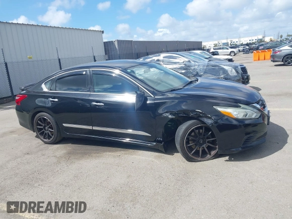 2016 Nissan Altima SR with VIN 1N4AL3AP2GC142213, listed as a IAAI auction lot 41946863 with 100,858 mi miles and . Bid and sale history available at carsss.com. Image 13.