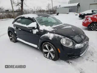 2012 Volkswagen Beetle 2.5L with VIN 3VWJX7AT9CM612892, listed as a Copart auction lot 48059405 with 106,416 mi miles and Salvage Title. Bid and sale history available at carsss.com. Image 4.