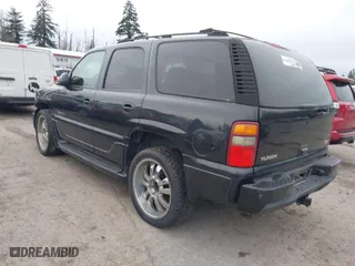 2003 GMC Yukon Denali with VIN 1GKEK63U73J310098, listed as a IAAI auction lot 41831615 with 262,134 mi miles. Bid and sale history available at carsss.com. Image 3.