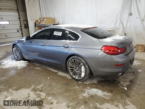 2014 BMW 6 Series 650i xDrive z VIN WBA6B4C59ED099398, wystawiony jako Copart lot #42305515 z przebiegiem 111 156 mil mil oraz Czysty tytuł • Clean title. Historia ofert i sprzedaży dostępna na DreamBid. Obrazek 2.