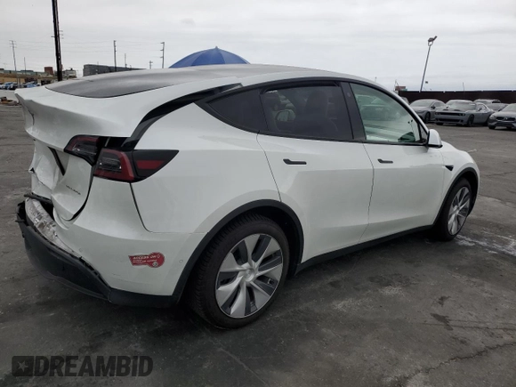 2021 Tesla Model Y Long Range with VIN 5YJYGDEEXMF151686, listed as a Copart auction lot 53903115 with 65,321 mi miles and Salvage Title. Bid and sale history available at DreamBid. Image 3.