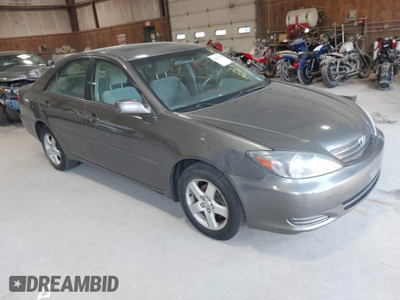 2004 Toyota Camry LE with VIN 4T1BE32K44U854932, listed as a IAAI auction lot 42133289 with 196,613 mi miles. Bid and sale history available at carsss.com. Image 1.