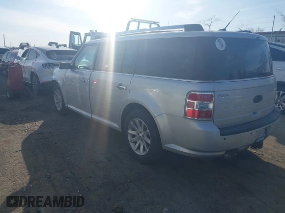 2011 Ford Flex SEL z VIN 2FMGK5CC2BBD21448, wystawiony jako IAAI lot #41814326 z przebiegiem 153 700 mil mil oraz . Historia ofert i sprzedaży dostępna na DreamBid. Obrazek 3.