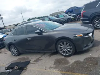 2021 Mazda 3 Preferred with VIN 3MZBPACL6MM252531, listed as a IAAI auction lot 42145811 with 35,869 mi miles and . Bid and sale history available at DreamBid. Image 12.