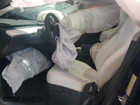 2023 Tesla Model Y Long Range with VIN 7SAYGDEE7PA112865, listed as a Copart auction lot 54626685 with 10,720 mi miles and Salvage Title. Bid and sale history available at DreamBid. Image 7.