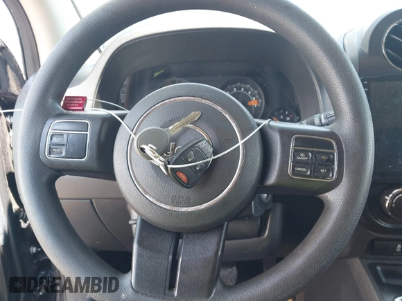 2016 Jeep Compass Sport with VIN 1C4NJCBA0GD560307, listed as a IAAI auction lot 42537535 with 178,194 mi miles and . Bid and sale history available at DreamBid. Image 11.