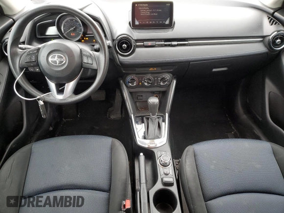 2016 Scion iA with VIN 3MYDLBZV4GY129184, listed as a Copart auction lot 47930305 with 66,400 mi miles and Salvage Title. Bid and sale history available at DreamBid. Image 8.