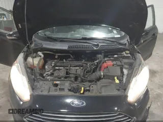 2016 Ford Fiesta SE z VIN 3FADP4BJ5GM151066, wystawiony jako IAAI lot #42200928 z przebiegiem 105 004 mil mil oraz . Historia ofert i sprzedaży dostępna na DreamBid. Obrazek 10.