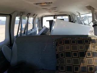 2004 Ford Econoline Wagon XL with VIN 1FBSS31LX4HB16895, listed as a Copart auction lot 65115554 with 48,980 mi miles and Salvage Title. Bid and sale history available at carsss.com. Image 10.