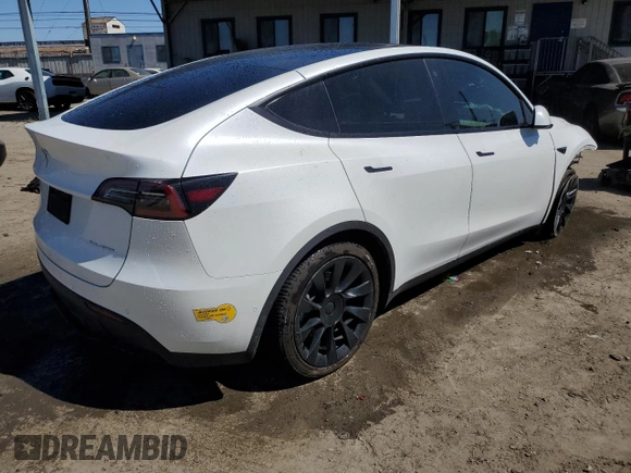2022 Tesla Model Y Long Range z VIN 7SAYGDEEXNF455766, wystawiony jako Copart lot #49641685 z przebiegiem 51 142 mil mil oraz Szkoda całkowita • Salvage title. Historia ofert i sprzedaży dostępna na DreamBid. Obrazek 3.