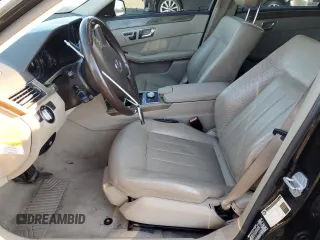 2011 Mercedes-Benz E 550 Luxury with VIN WDDHF9AB2BA264183, listed as a Copart auction lot 46336995 with 184,659 mi miles and Salvage title. Bid and sale history available at DreamBid. Image 7.