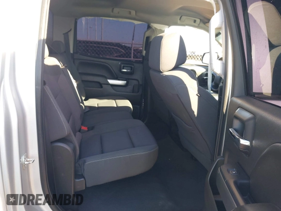 2018 Chevrolet Silverado 1500 LT with VIN 3GCPCREC9JG574686, listed as a IAAI auction lot 41676124 with 74,239 mi miles and . Bid and sale history available at DreamBid. Image 8.