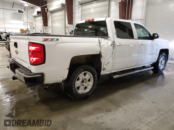 2014 Chevrolet Silverado 1500 LT with VIN 3GCUKREC0EG294862, listed as a Copart auction lot 53504995 with 115,164 mi miles and Salvage Title. Bid and sale history available at DreamBid. Image 3.