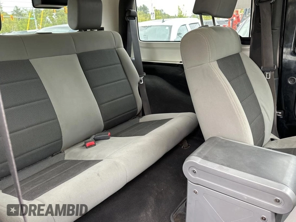 2008 Jeep Wrangler X with VIN 1J4FA24168L582227, listed as a Copart auction lot 58219065 with 98,284 mi miles and Salvage title. Bid and sale history available at DreamBid. Image 6.