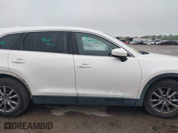 2019 Mazda CX-9 Touring with VIN JM3TCACY2K0328347, listed as a IAAI auction lot 41917854 with 67,173 mi miles and . Bid and sale history available at DreamBid. Image 13.
