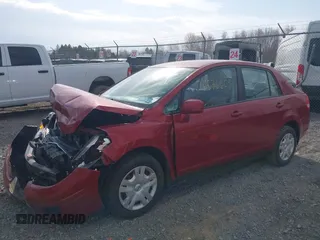 2011 Nissan Versa 1.8 S with VIN 3N1BC1AP2BL392635, listed as a IAAI auction lot 41836609 with 97,039 mi miles. Bid and sale history available at carsss.com. Image 2.