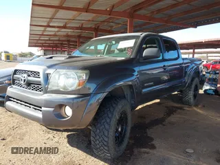 2011 Toyota Tacoma with VIN 3TMMU4FN0BM032561, listed as a IAAI auction lot 41190472 with 188,862 mi miles and . Bid and sale history available at DreamBid. Image 18.