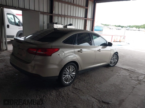 2017 Ford Focus Titanium with VIN 1FADP3J26HL279839, listed as a IAAI auction lot 42466826 with 202,795 mi miles and . Bid and sale history available at DreamBid. Image 4.