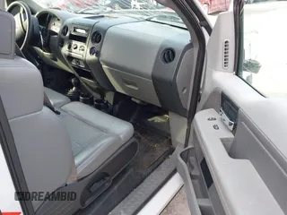 2005 Ford F-150 STX with VIN 1FTRX14W85FB72787, listed as a IAAI auction lot 41702370 with 210,544 mi miles. Bid and sale history available at carsss.com. Image 5.