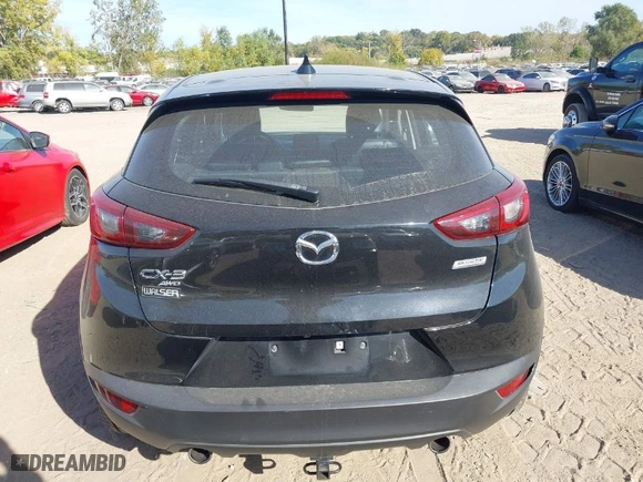 2018 Mazda CX-3 Touring with VIN JM1DKFC75J1302046, listed as a IAAI auction lot 40570799 with 62,554 mi miles. Bid and sale history available at carsss.com. Image 16.