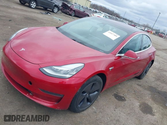 2018 Tesla Model 3 Long Range Battery with VIN 5YJ3E1EB3JF129772, listed as a IAAI auction lot 42017305 with 103,825 mi miles and . Bid and sale history available at DreamBid. Image 2.